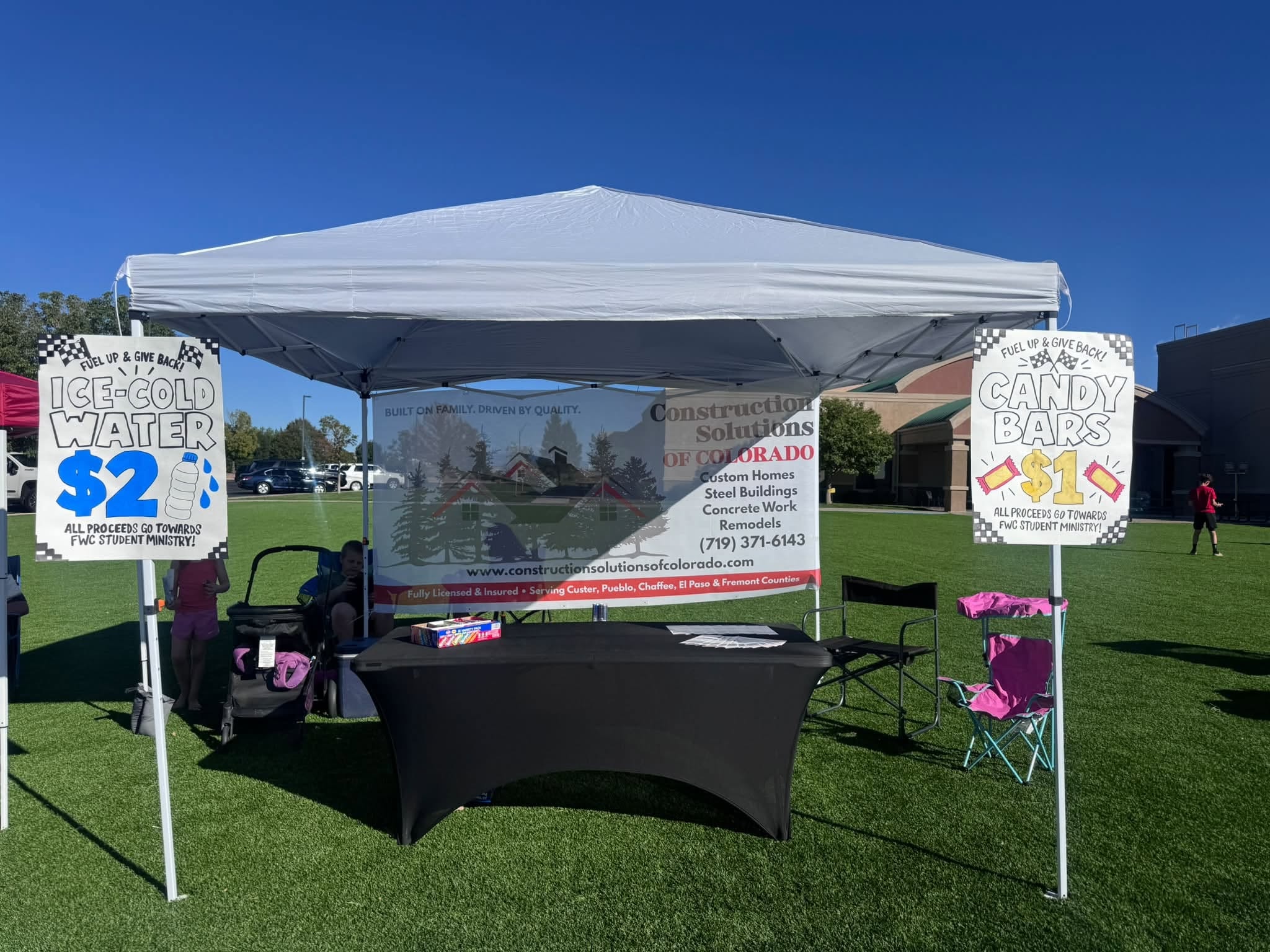 Construction Solutions of Colorado booth at FWC Fuel Up and Give Back community event